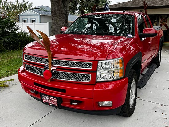 The Real Papa Claus red truck